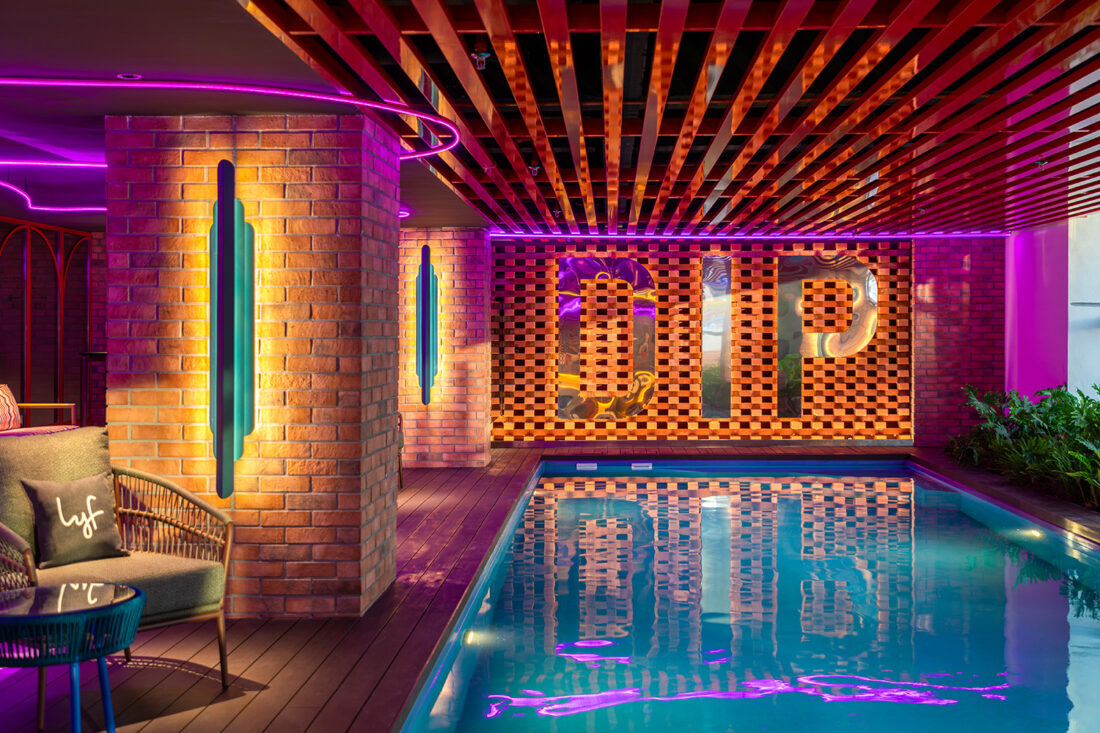 Cool off with a DIP in the pool as you enjoy a unique view onto the street and nightlife below