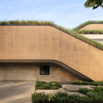 Sloping Green Roofs "Keep the Family Connected" at This Indonesian Home