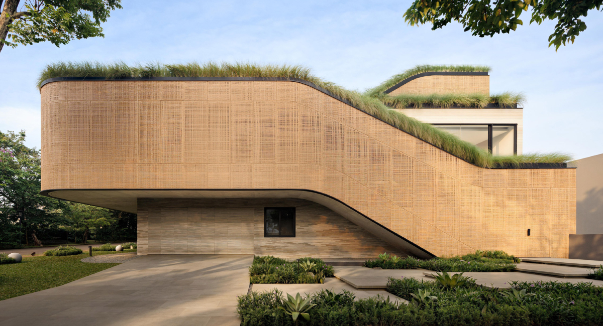 Sloping Green Roofs “Keep the Family Connected” at This Indonesian Home